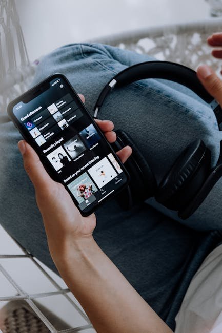 Smartphone displaying music app for AI-powered music discovery