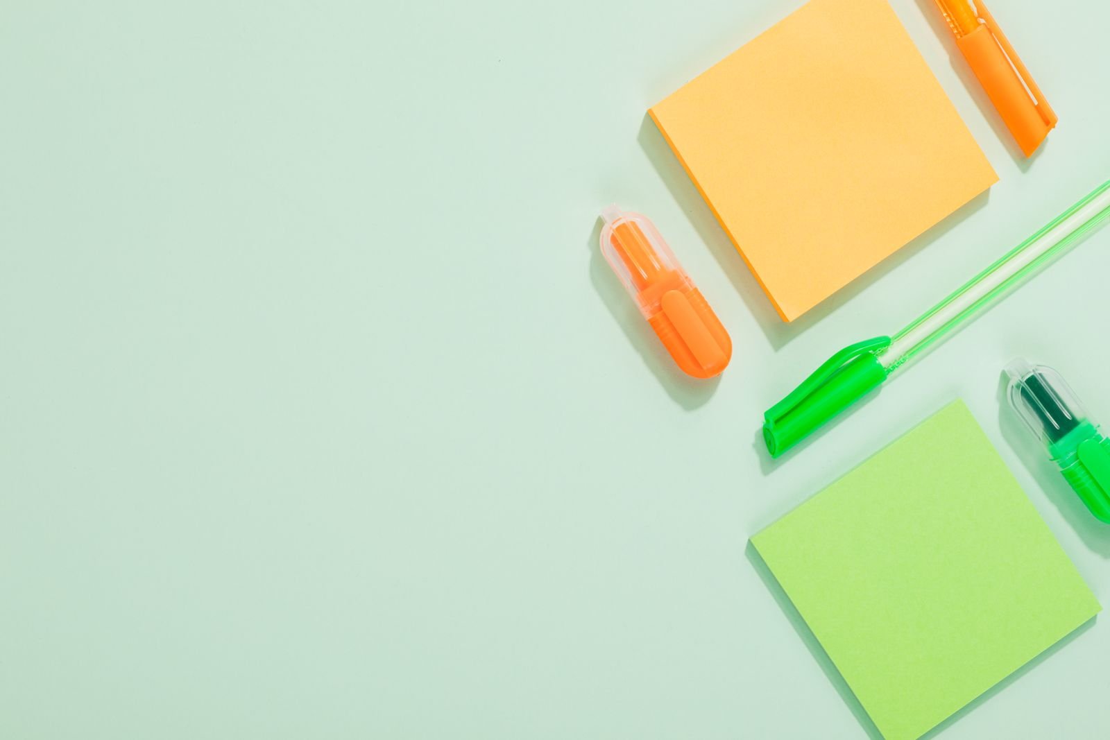 Sticky notes and highlighters on a desk, the kind of material Gemini in Classroom turns into flashcards and quizzes